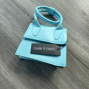 Blue top handle bag